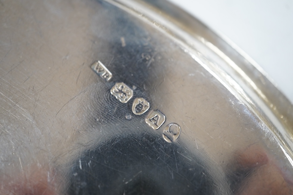 A George III engraved silver oval teapot stand, London, 1796, on four swept feet, 17.3cm, 137 grams. Condition - poor.